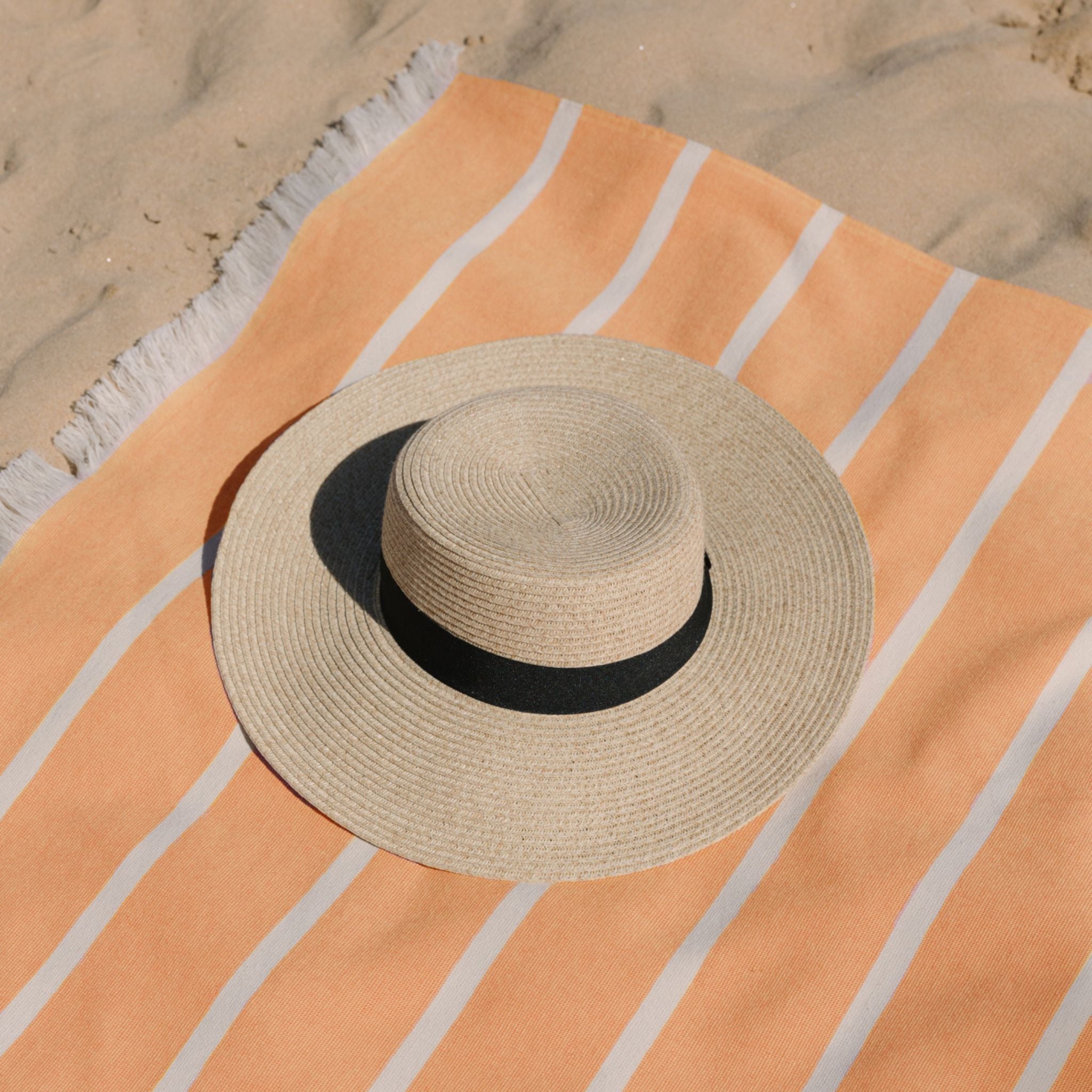 torres-novas-beach-belem-horizontal-stripes-towel-orange-lifestyle-1.jpg