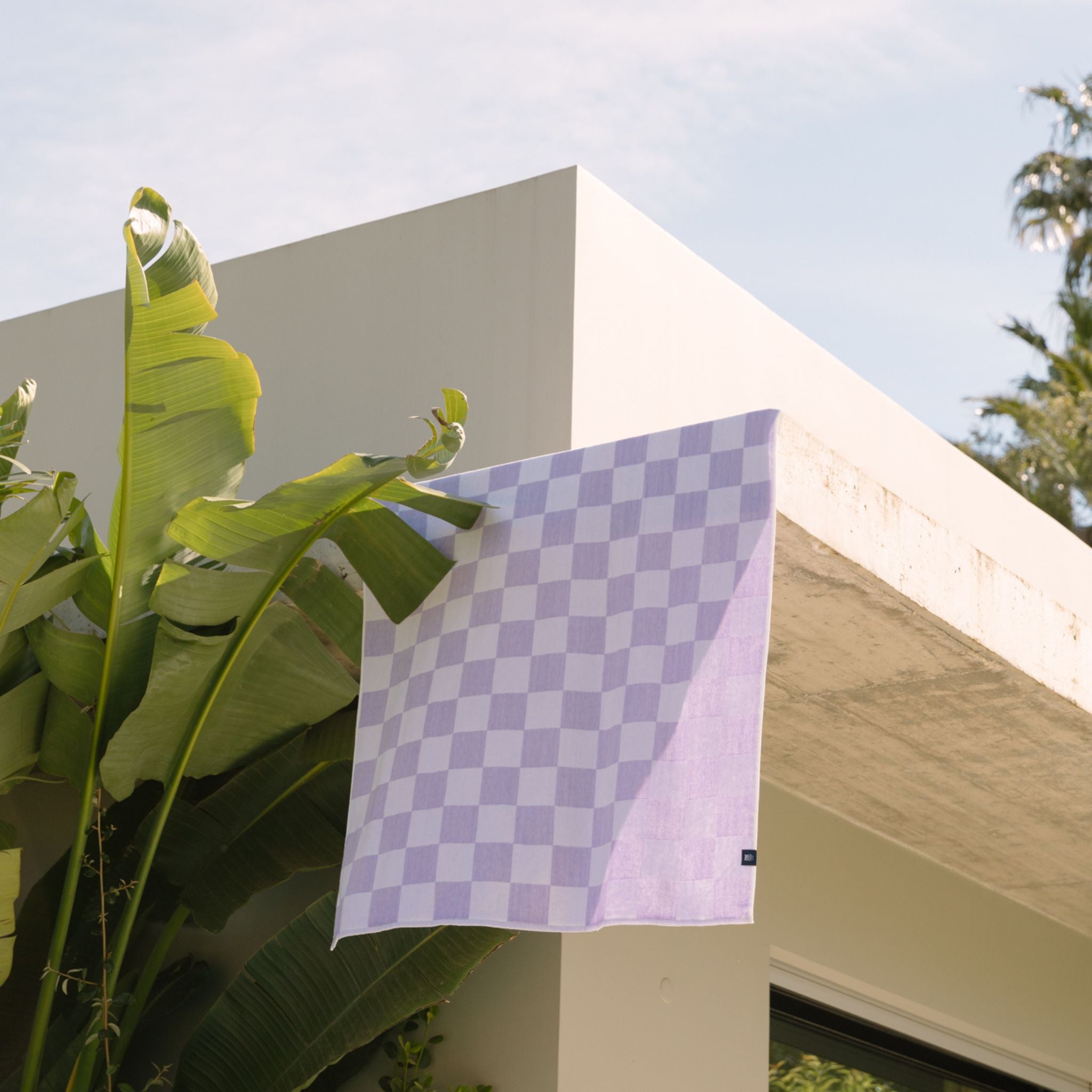 torres-novas-beach-chequered-gibalta-checkers-towel-lavander-lifestyle-3.jpg