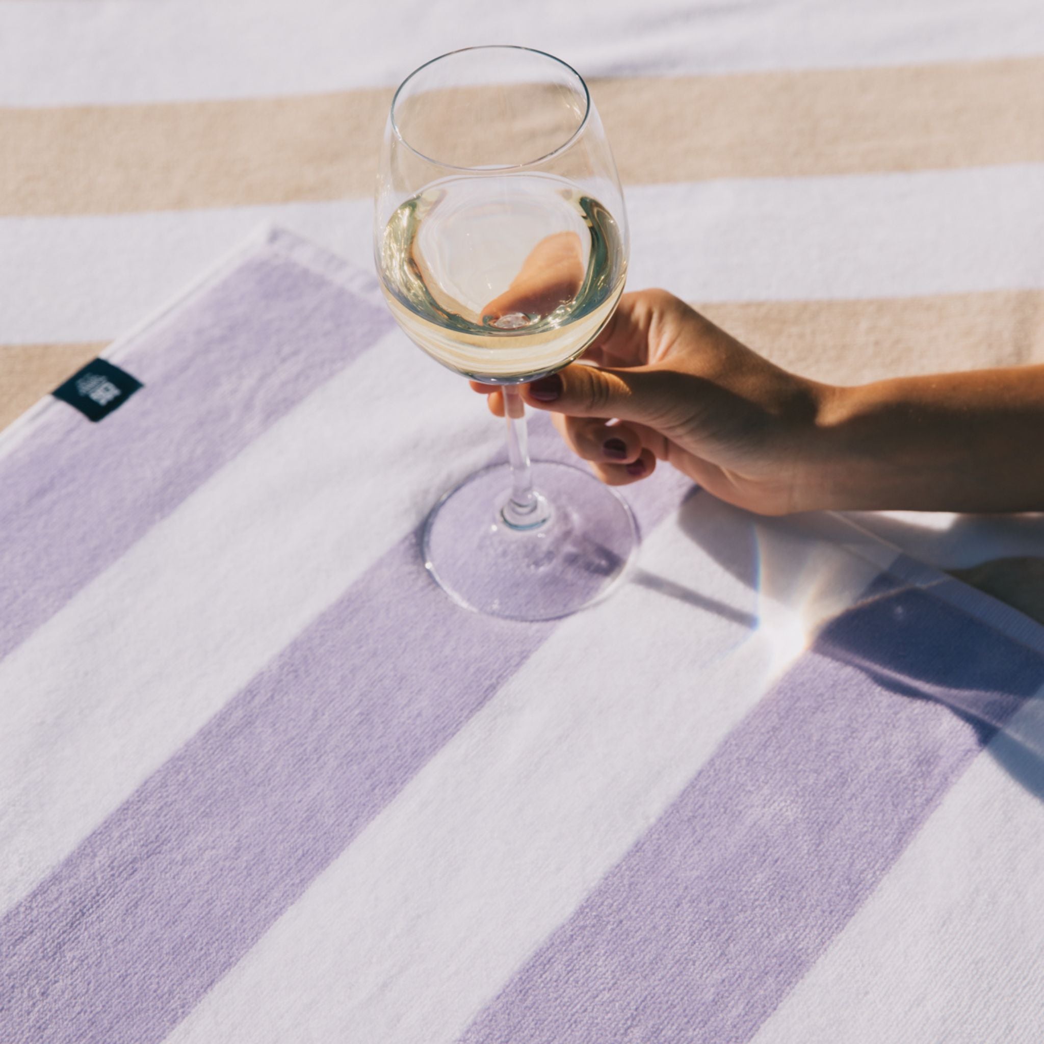 torres-novas-beach-gibalta-vertical-stripes-towel-lavender-lifestyle-2_3c1120c8-2c53-433a-b680-c3c491cf0dcd.jpg
