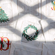 Ropa de mesa Mafra con bordado navideño