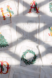 Mafra napkins embroidered with gold Christmas letters (Pack of 2)