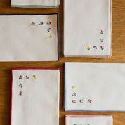 Linge de table Nazaré écru, en coton, avec de fleurs brodées