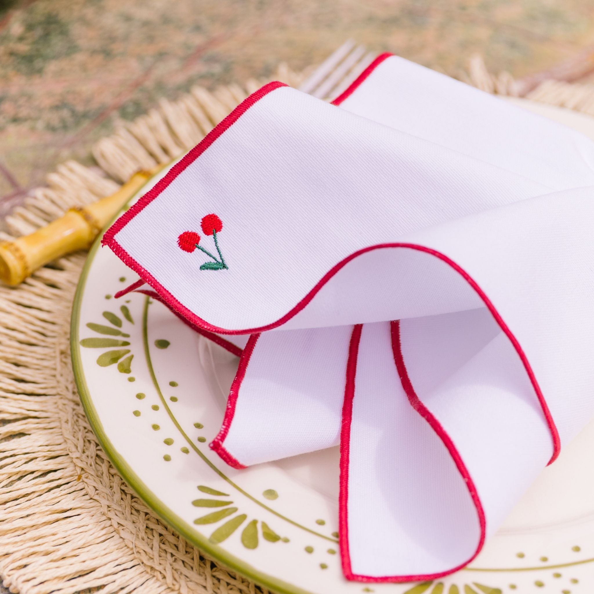 torres-novas-table-nazare-embroidery-fruits-white-napkin-red-lifestyle.jpg