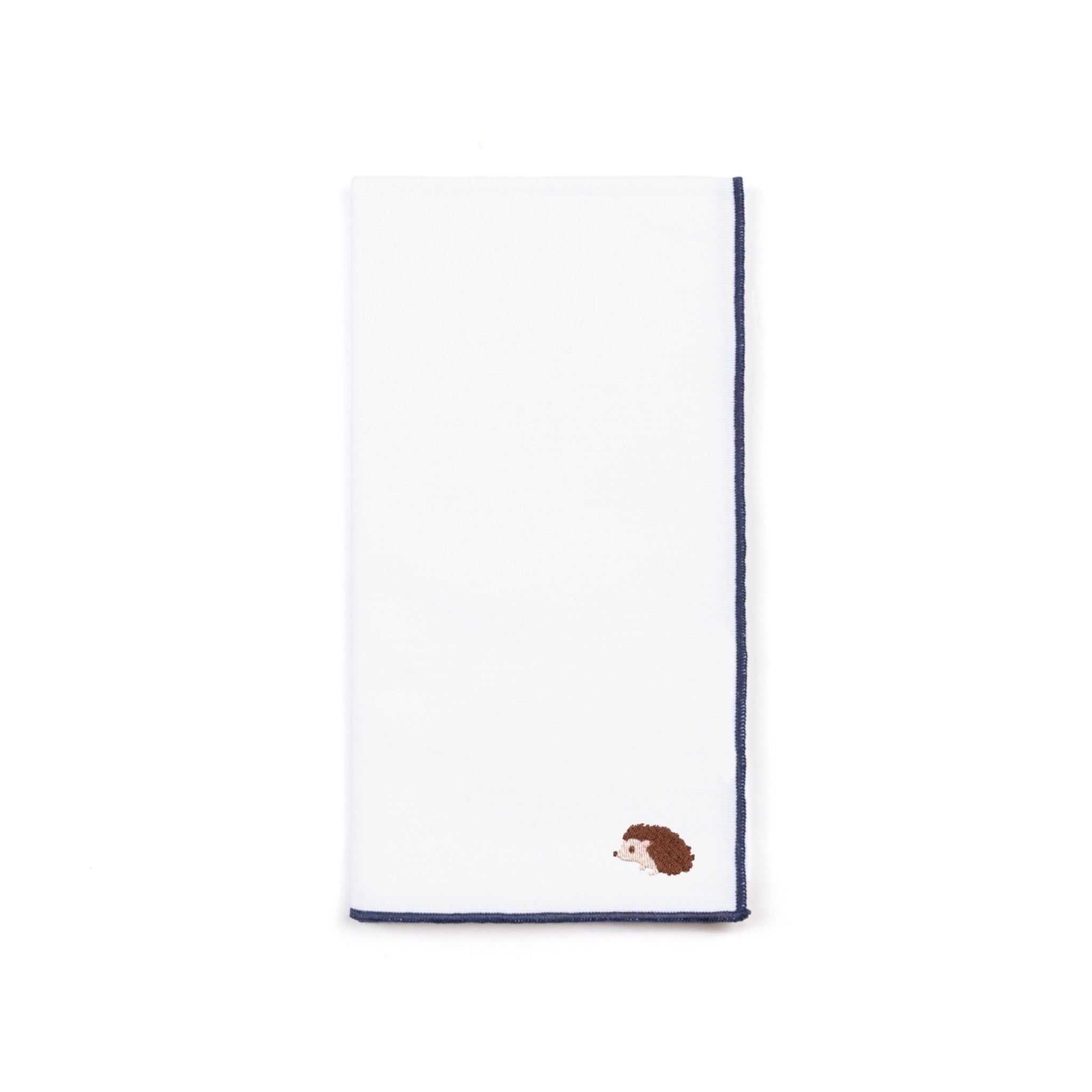 torres-novas-table-nazare-solid-white-napkin-blue-product-embroidery-fall-hedgehog.jpg