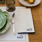 Nazaré white cotton table linen with embroidered Portugal-inspired motifs - Torres Novas