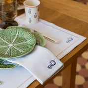 Nazaré white cotton table linen with embroidered Portugal-inspired motifs - Torres Novas