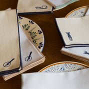 Nazaré white cotton table linen with embroidered Portugal-inspired motifs - Torres Novas
